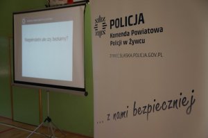 baner żywieckiej policji i slajd prezentacji